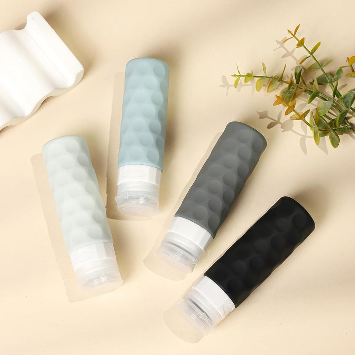 Travel Bottles for Toiletries, 4Pcs Tsa Approved 3Oz Travel Size Containers, BPA Free Leak Proof Premium Silicone Bottles, Refillable Liquid Squeezable Accessories W/Toiletry Bag