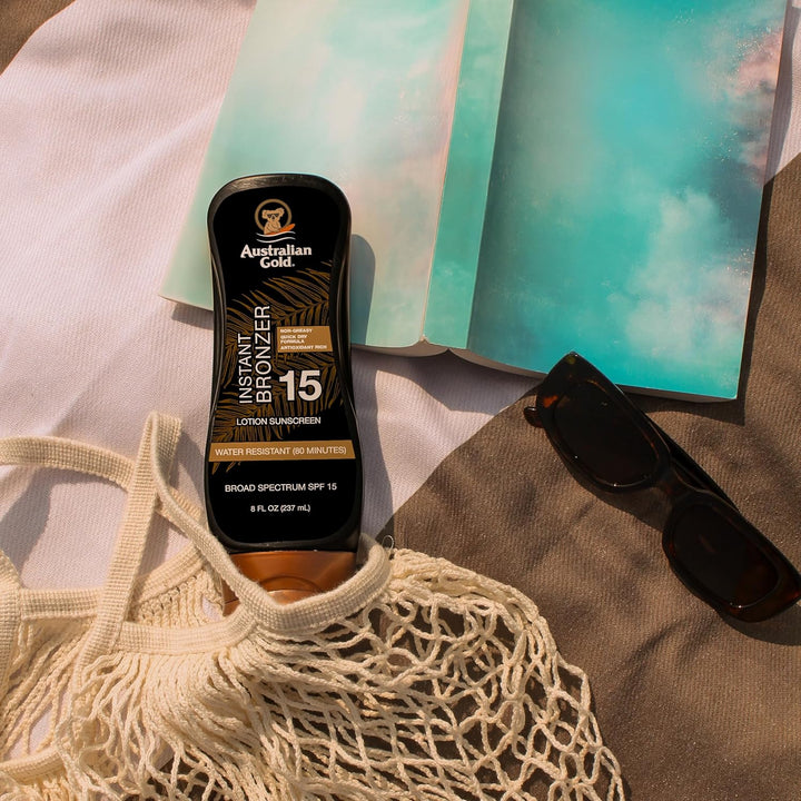 Sunscreen Lotion with Instant Bronzer SPF 15, 8 Ounce | Broad Spectrum | Water Resistant | Non-Greasy | SPF 15 8 Fl Oz (Pack of 1)