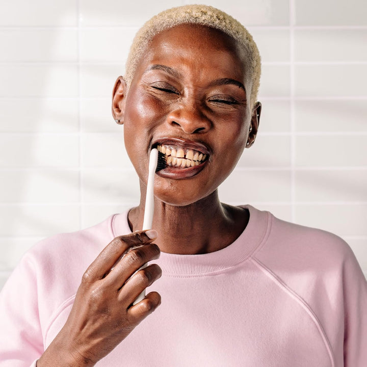 Classic Manual Toothbrush with Extra Soft Activated-Charcoal, Tapered Bristles, Bioplastic Handle That Includes Travel Cap, Dentist-Approved, Great for Adults and Kids, Mint (Pack of 1)